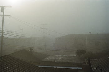 fog-sky-rooftops-buildings-royalty-free-thumbnail.jpg