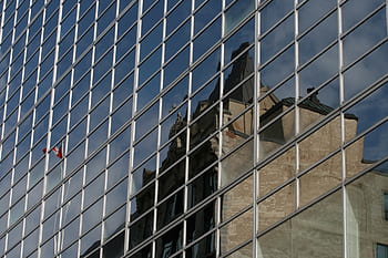 glass-building-city-wall-reflection-flag-royalty-free-thumbnail.jpg