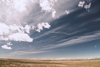 grass-field-sky-clouds-sunlight-country-royalty-free-thumbnail.jpg