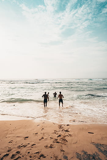 friends-running-beach-man-woman-swim-royalty-free-thumbnail.jpg