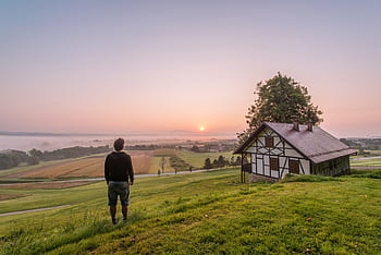 green-grass-fields-rural-countryside-house-royalty-free-thumbnail.jpg