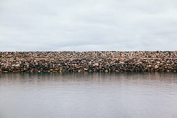 grey-sky-clouds-rocks-royalty-free-thumbnail.jpg