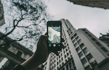 hand-camera-capture-phone-building-structure-royalty-free-thumbnail.jpg