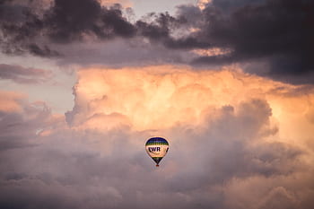 hot-air-balloon-cloudy-sky-sunset-royalty-free-thumbnail.jpg